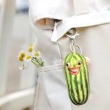 -Printed plush with attached ring for use with keys, backpack, as a zipper pull, etc. This item ships from abroad and averages 2-3 weeks for delivery to the USA. green cucumber keychain plush weird freaky face wtf watermelon striped pickle novelty toy gift -