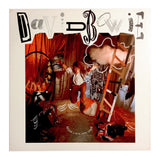 -A small number of these 12x12 posters were sent to select US record stores in 1987 for use in creating displays to promote the release of David Bowie's 'Never Let Me Down' The majority were damaged or destroyed during the promotion and this is one of a very small number which have survived. -