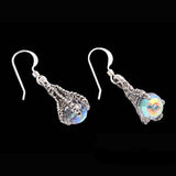 THE HOBBIT Official Smaug Claw Arkenstone Earrings-Officially Licensed Arkenstone Earrings Inspired by JRR Tolkien's The Hobbit. 3D dragon claws in .925 sterling silver on French ear wires. The Arkenstones are 8 mm (5/16 inch) Swarovski Crystal spheres. Brand New in Box with Certificate of Authenticity. genuine artisan handcrafted fantasy jewelry made in the usa. -