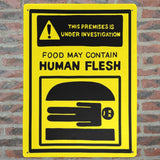 -Funny "! This Premises Is Under Investigation - Food May Contain Human Flesh" Metal Sign. Rust and fade resistant, 4 holes at corners for mounting or hanging. Free Shipping from abroad. Humorous horror cannibal burger warning people bob's halloween health inspector meat kitchen caution prop replica restaurant decor-