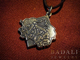 -A celebration of size & attitude. The pendant features Penny Rolle's tattoo of two rearing elephants flanking the words "BORN BIG" with "Bold, Beautiful and BAAAAAAD" on the reverse. Officially licensed. Made in the USA. Image Comics Kelly Sue DeConnick Valentine DeLandro Feminist LGBTQ LGBTQIA Pride Body Positivity-