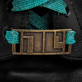 -The NC (Non-Compliant) mark is used to humiliate and isolate those who defy patriarchal overlords but many consider it a battle scar, a symbol of feminist strength and power. Genuine leather wrist strap cuff bracelet with antiqued bronze NC tag. Official Image Comics Bitch Planet accessory. Handmade in USA, New w/COA-
