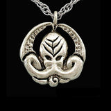 -Inspired by the writings of H.P. Lovecraft, Call of Cthulhu and The Shadow Over Innsmouth. Handmade Miskatonic medallion with chant engraved on the reverse: "Ph'nglui mglw'nafh Cthulhu R'lyeh wgah'nagl fhtagn" (In his house at R'lyeh dead Cthulhu waits dreaming) Jeweler handcrafted in the USA of high quality bronze. -