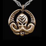 -Inspired by the writings of H.P. Lovecraft, Call of Cthulhu and The Shadow Over Innsmouth. Handmade Miskatonic medallion with chant engraved on the reverse: "Ph'nglui mglw'nafh Cthulhu R'lyeh wgah'nagl fhtagn" (In his house at R'lyeh dead Cthulhu waits dreaming) Jeweler handcrafted in the USA of high quality bronze. -Yellow Bronze-24" Plated Chain-