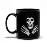 -Premium quality black mug in your choice of 11oz or 15oz. High quality, durable ceramic. Microwave safe, hand washing recommended to help prevent fading. Made-to-order and shipped from USA. Classic horror serial villain fiend creepy punk rock skeleton coffee cup mug halloween icon skull misfits gift black crimson red -