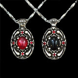 Dracula Life/Death Pendant Necklaces, Sterling Silver Vampire Jewelry-Sterling Silver Bram Stoker's Dracula Life or Death pendant necklace representing elements of the classic, world famous gothic horror vampire story. Choice of central stone, a red lab-grown star ruby or natural black onyx. 20 inch stainless steel drip chain. Handcrafted Fine Silver Jewelry. Made in the USA. -
