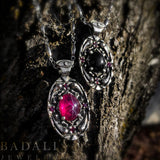 Dracula Life/Death Pendant Necklaces, Sterling Silver Vampire Jewelry-Sterling Silver Bram Stoker's Dracula Life or Death pendant necklace representing elements of the classic, world famous gothic horror vampire story. Choice of central stone, a red lab-grown star ruby or natural black onyx. 20 inch stainless steel drip chain. Handcrafted Fine Silver Jewelry. Made in the USA. -