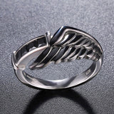 Final Fantasy VII Sephiroth Dark Angel Wing Ring, Sterling Silver-High quality ring inspired by Sephiroth's from Final Fantasy. Handcrafted in .925 Sterling Silver with jeweler's blacking and 18K white gold plating, a large dark wing featured at center, offset and accented with four square cut natural black gemstones. Brand New in jeweler's ring box. Free Shipping Worldwide.-
