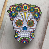 -Lady Sugar Skull soft enamel pin. She has lots of detailed features filled in with bright colors and a lovely floral head piece. Soft enamel pin measuring approximately 1.5in with 2 posts and rubber pin back. Shipped from the USA. Halloween dia de los muertos pinback bag backpack hat accessory badge g-