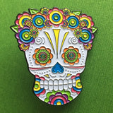 -Lady Sugar Skull soft enamel pin. She has lots of detailed features filled in with bright colors and a lovely floral head piece. Soft enamel pin measuring approximately 1.5in with 2 posts and rubber pin back. Shipped from the USA. Halloween dia de los muertos pinback bag backpack hat accessory badge g-