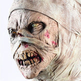 -The reanimated corpse of an unfortunate hospital patient with head bandages still in place. High quality latex over-the-head mask. One size fits most. Free shipping from abroad. Decaying decrepit medical patient zombie mummy bandaged head halloween costume cosplay asylum hospital haunted house larp-