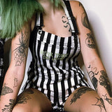 Never Trust The Living Womens Black and White Striped Shortalls -Black and white striped, high waisted womens shorttalls. 'Never Trust The Living' embroidered across chest, beetle and skull detailing on the leg.Quality construction and embroidering. Free shipping. Kustom kowai goth gothic stripes streetwear tim burton beetlejuice inspired harajuku horror jumper romper shorts.-