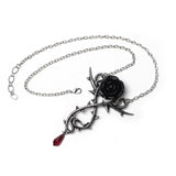 -Roses are red, or so the aphorism goes... but not in the mountains of Romania, where the darkest of romances prevail. Lead and nickel free Fine English Pewter. Genuine Alchemy Gothic product. Shipped from the USA. black rose goth gothic necklace thorned vine crystal drop dark romance valentines day love hearts-