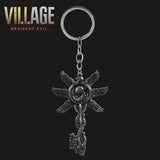 -Six Winged Unborn Key replica from Resident Evil 8: Village. Full size key pendant measures roughly 5.2 x 8cm / 2 x 3.15 inches on key holder ring. Free shipping. RE8 zombie biohazard cosplay accessory prop replica gamer gaming Moreau Heisenberg stronghold feathered fetus key chain gift -