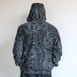 -Quality hi-vis hooded jacket with rainbow reflective paint swirl pattern. Zipper front hoodie, pockets, drawstring hood. Muted appearance in daylight, highly reflective in dusk and dark. Free shipping. Night safety jogging running walking biking safe rave streetwear unique high visibility designer clubwear fashion-