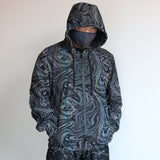 -Quality hi-vis hooded jacket with rainbow reflective paint swirl pattern. Zipper front hoodie, pockets, drawstring hood. Muted appearance in daylight, highly reflective in dusk and dark. Free shipping. Night safety jogging running walking biking safe rave streetwear unique high visibility designer clubwear fashion-