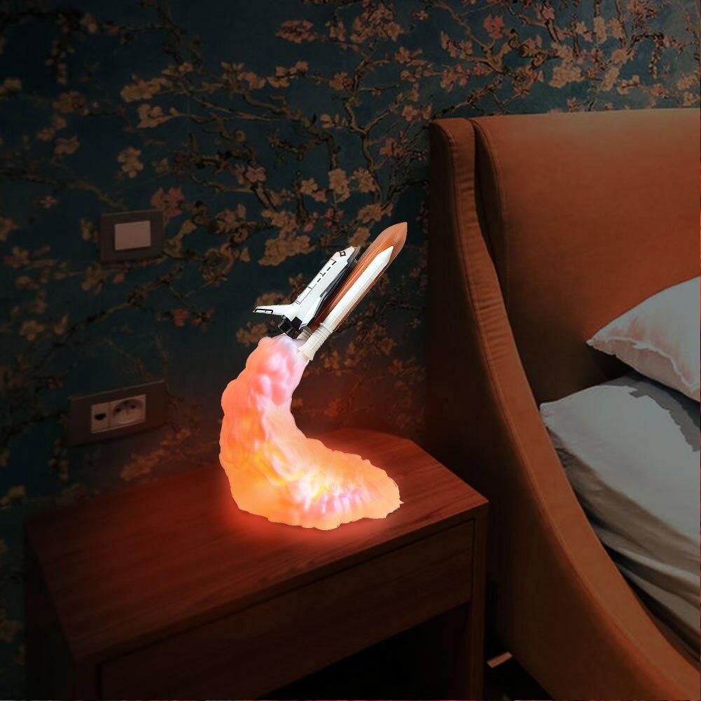 SPACE SHUTTLE LAMP USB Rechargable LED Nightlight Astronaut Kids Decor-4... 3.... 2.... 1.... We have lift-off! A fun, creative and inspirational night light lamp for future space explorers and astronomy enthusiasts depicting a space shuttle in mid-launch the billowing smoke below illuminated by the rocket boosters as it blasts its way to greater knowledge of the universe. USB powered rech-