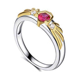 Legend of Zelda Ocarina of Time Sterling Goron Ruby Hylian Shield Ring-High quality ring inspired by the second of the spiritual stones, Goron's Ruby and the Hylian Shield. Handcrafted in .925 sterling silver with 18K gold plated accents and set with CZ crystals.Brand new in jeweler's ring box. Not to be confused with some of the cheap metal alloy knock-offs. Free Shipping Worldwide.-