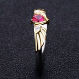 Legend of Zelda Ocarina of Time Sterling Goron Ruby Hylian Shield Ring-High quality ring inspired by the second of the spiritual stones, Goron's Ruby and the Hylian Shield. Handcrafted in .925 sterling silver with 18K gold plated accents and set with CZ crystals.Brand new in jeweler's ring box. Not to be confused with some of the cheap metal alloy knock-offs. Free Shipping Worldwide.-