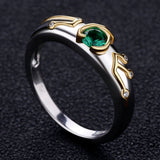 Legend of Zelda Sterling Silver Breath of the Wild Kokiri Emerald Ring-High quality ring inspired by the Kokiri's Emerald and Sheikah Slate. Handcrafted in .925 sterling silver with 18K gold plated accents and set with emerald green and clear CZ crystals. Brand new in jeweler's ring box. Not to be confused with some of the cheap metal alloy knock-offs. Free Shipping Worldwide.-