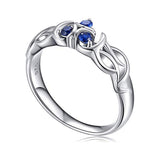Legend of Zelda Breath of the Wild Zora Engagement Ring, 925 Silver-The Zora's Sapphire the spiritual stone of water in the form of the engagement ring given to Link by Princess Ruto. High quality, handcrafted ring in .925 sterling silver set with CZ gemstones. Brand new, carefully packed and shipped. Free shipping from the USA and abroad. -