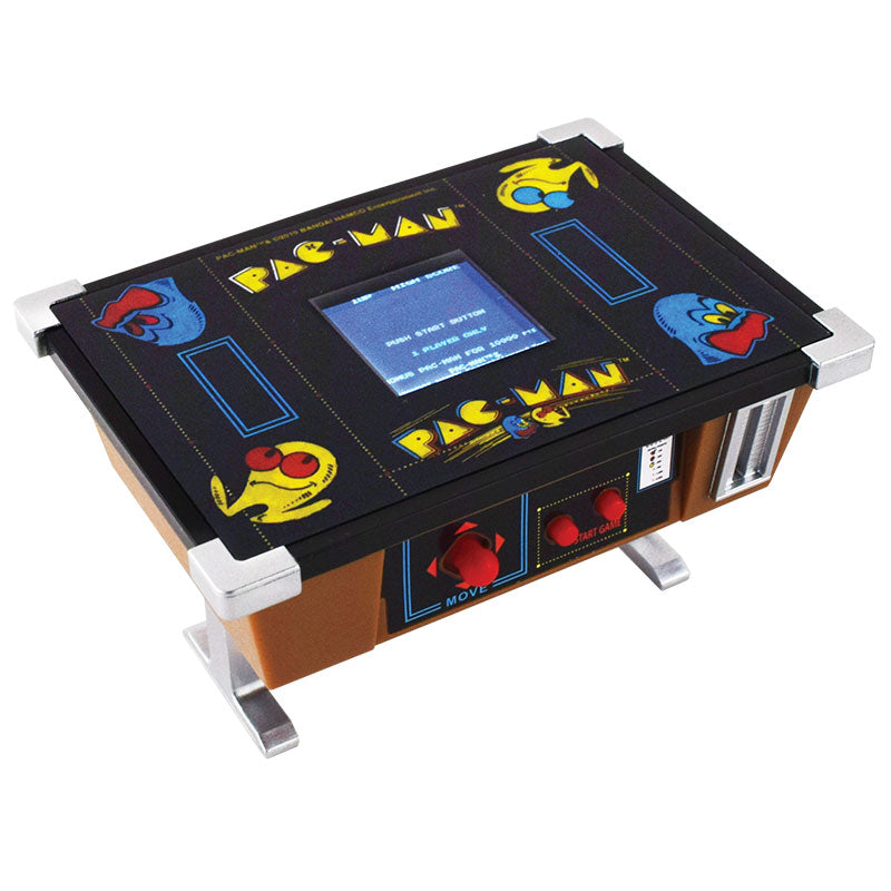 -A tiny working, miniature version of the original 1980s classic 'cocktail table' style PacMan arcade game cabinet that fits in the palm of your hand. Hi-res screen, joystick & buttons. Complete gameplay with authentic graphics and sounds. World's smallest version! Officially licensed Namco product. Shipped from USA. -
