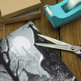 -58" x 23" rolls of high quality 5.93oz gift wrap. Free Shipping. 25% off 2 or more rolls w/code 'WRAPPERSDELIGHT' at checkout. goth gothic christmas xmas winter halloween holiday wrapping paper creepy dark weird unusual unique horror solstice alternative secular emo heavy metal death spooky graves-