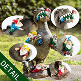 Gnome Chomping Dinosaur Garden Statue, Funny Outdoor Sculpture 3 Sizes-Garden-size dinos are still around, it's a fact! The toothy monsters reign terror on gnomekind. Gnomes chomped and chewed, miniature gojira massacres, entire gnome villages trampled by pint-sized kaijus, Oh the horror! Detailed resin sculpture 15cm/5.9in, 24cm/9.5in or 30cm/~12in. Free shipping to USA. t-rex godzilla-