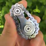 -Metal bicycle-style chain and sprocket fidget toy. Durable, high quality construction. Measures approximately 3cm x 6cm / 1.2 x 2.4 inches. Free shipping from abroad. Typically arrives in about 2-3 weeks. Unique different spinning link chain and gear anxiety diffusing perpetual motion machine toy-