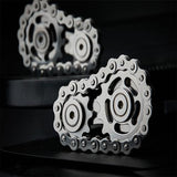 -Metal bicycle-style chain and sprocket fidget toy. Durable, high quality construction. Measures approximately 3cm x 6cm / 1.2 x 2.4 inches. Free shipping from abroad. Typically arrives in about 2-3 weeks. Unique different spinning link chain and gear anxiety diffusing perpetual motion machine toy-
