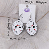 -Classic horror hockey mask drop / dangle earrings in acrylic. Each measures about 35x27mm on stainless steel ear wires. Free shipping from abroad with average delivery to the USA in 2-3 weeks. High quality jason 13th halloween friday movie mask goth gothic jewelry earrings fashion accessory-