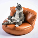 -Nicely detailed 1:6 scale fat cat figurine with faux leather sofa display stand. Cat is crafted in high quality resin and measures approximately 7.5 cm / 2.9 inches tall. New in box, guaranteed quality. Free shipping. Funny sweet realistic collectible 1/6 orange black white brown gray tabby kitty figure gift -