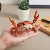 Crab Phone Stand and Bluetooth Speaker-High quality crab shaped bluetooth audio speaker and universal phone stand. Good volume and sound. ~6 x 5 with 52mm/2" speaker. Free shipping. Funny wireless rechargeable audio phone holder realistic crab claws crabby gift florida maryland alaska louisiana seattle alabama oregon california seafood office desk decor -