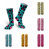 -High quality, mid-calf length socks featuring classic bright and boldly colored retro leopard print. Soft and comfortable, one size fits most teens and adults. Free shipping. Unisex mens womens 80s 90s eighties 90s new wave frank memphis color animal print lisa vintage style streetwear skating skate punk pop wild rad-