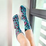-High quality, mid-calf length socks featuring classic bright and boldly colored retro leopard print. Soft and comfortable, one size fits most teens and adults. Free shipping. Unisex mens womens 80s 90s eighties 90s new wave frank memphis color animal print lisa vintage style streetwear skating skate punk pop wild rad-