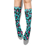 -High quality, mid-calf length socks featuring classic bright and boldly colored retro leopard print. Soft and comfortable, one size fits most teens and adults. Free shipping. Unisex mens womens 80s 90s eighties 90s new wave frank memphis color animal print lisa vintage style streetwear skating skate punk pop wild rad-