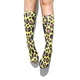 -High quality, mid-calf length socks featuring classic bright and boldly colored retro leopard print. Soft and comfortable, one size fits most teens and adults. Free shipping. Unisex mens womens 80s 90s eighties 90s new wave frank memphis color animal print lisa vintage style streetwear skating skate punk pop wild rad-