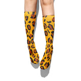 -High quality, mid-calf length socks featuring classic bright and boldly colored retro leopard print. Soft and comfortable, one size fits most teens and adults. Free shipping. Unisex mens womens 80s 90s eighties 90s new wave frank memphis color animal print lisa vintage style streetwear skating skate punk pop wild rad-