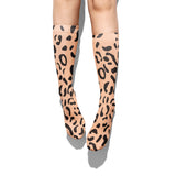 -High quality, mid-calf length socks featuring classic bright and boldly colored retro leopard print. Soft and comfortable, one size fits most teens and adults. Free shipping. Unisex mens womens 80s 90s eighties 90s new wave frank memphis color animal print lisa vintage style streetwear skating skate punk pop wild rad-
