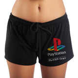 PLAYSTATION Juniors Classic Playstation Logo Sleep Shorts, Official-Game in comfort wearing these comfy sleep shorts. A pair of black pajama shorts made of soft and comfortable 100% cotton with a drawstring waistband and Playstation graphic print on the left leg. Officially licensed Sony Playstation apparel. Shipped from USA. Womens pajamas sleepwear loungewear gamer gaming videogame-