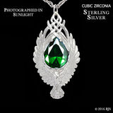 -Pendant necklace version of The Elessar, a silver eagle brooch set with a great green stone given to Aragorn by Galadriel as the fellowship departed Lothlórien in JRR Tolkien's The Fellowship of the Ring. Officially licensed Middle Earth replica jewelry. Handcrafted in the USA of fine white bronze or sterling silver. -Sterling Silver-Cubic Zirconia-24in Stainless Steel Rope Chain-