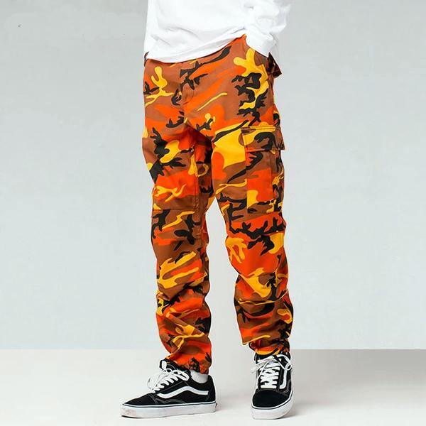 At Ease Baggy Color Camo Cargo Pants, Retro 1990s Colorful Camouflage-Baggy retro vintage colorful camo cargo pants with plenty of pockets, button fly and cord cinched ankles. Quality unisex 90s style fashion tactical trousers in your choice of color. 100% cotton. 

Streetwear orange blue green yellow red purple pink mens womens teens adults big for sam designer classic alternative nu metal-