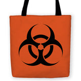 -High quality, woven polyester carryall tote bag with design on both sides. Durable and machine washable. Orange and black with large Biohazard caution symbol. Great gothic, punk or gamer accessory. This item is made-to-order and typically ships in 3-5 business days.-