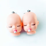 -Uniquely creepy vintage style babydoll head earrings. Free Shipping Worldwide. These ship from abroad and typically arrive in about 2 weeks. Funny weird emo goth gothic harajuku punk baby doll head drop / dangle earrings. -Pacifier-