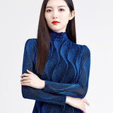 -Blue women's long sleeve blouse with a unique wave-like pattern. High quality polyester, cotton and bamboo blend. Free shipping from abroad with average delivery in 2-4 weeks. These are a slim fit and run quite small. 
beautiful womens juniors fall autumn winter longsleeve wavy ruffle knit top shirt slimming -
