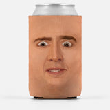 Creepy Cage Face Insulator Sleeve, Funny Weird Meme Can Cooler Wrap-High quality, reusable neoprene beverage insulator sleeve. Fits most standards 12 and 16oz cans or bottles and keeps beverages cold. Easy to clean and foldable for easy storage. Funny Creepy Cage Face weird face off nic meme image. Great gift or drink marker for parties. -