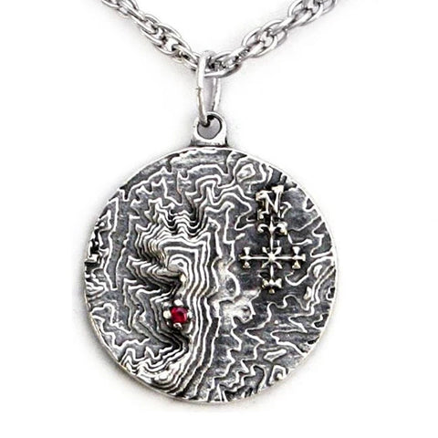 Castle Dracula Map Necklace - Great Classic Vampire Gothic Horror Gift-Sterling Silver medallion featuring a topographical map of the Transylvanian mountain range, a blood red imitation garnet stone marking the location of Castle Dracula, Mount Izvorul Calimanului in the Kelemen Alps, Transylvania Romania bordering Moldavia/Moldova. 

Officially Licensed Bram Stoker jewelry. Made in USA. -Sterling Silver-24" Stainless Steel Curb Chain-