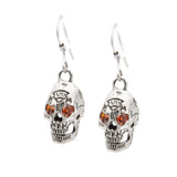 DRESDEN FILES Official BOB THE SKULL Earrings, 3D Sterling Silver-Bob The Skull, a smart-mouthed spirit entity in the possession of powerful wizards since the dark ages and current assistant to Harry Dresden.

Official, handcrafted .925 sterling silver and CZ Dresden Files 3D Bob The Skull earrings - Good Bob, the rarely seen Evil Bob or one of each. Made in the USA. New with COA. -Good Bob (Orange CZ)-