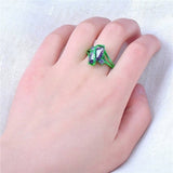 -These rings are truly unique, vivid, attention grabbing statement pieces! Brightly colored green swooping S-shaped ring with purple CZ stones. Free shipping.

Stunner brilliant flashy beautiful stunning poison ivy shocking oval marquis mardi gras zirconia costume cosplay futuristic fantasy fashion jewelry-