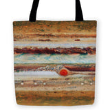 -High quality, woven polyester carryall fabric tote with design on both sides. The seemingly abstract design was actually created using surface maps of planet Jupiter, earth-tone stripes, perfectly accented with its famous red eye. A stylish, modern accessory for science or sci-fi geeks. Durable and machine washable. -